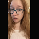 A cute redhead girl wearing glasses records herself from a between the legs perspective as she takes a shit into a toilet. Vertical HD format video. Over a minute.